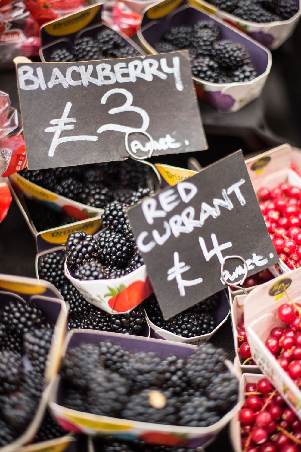 Blackberry and red currant display at Borough Market, London