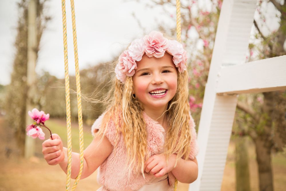 family photography of girl on swing