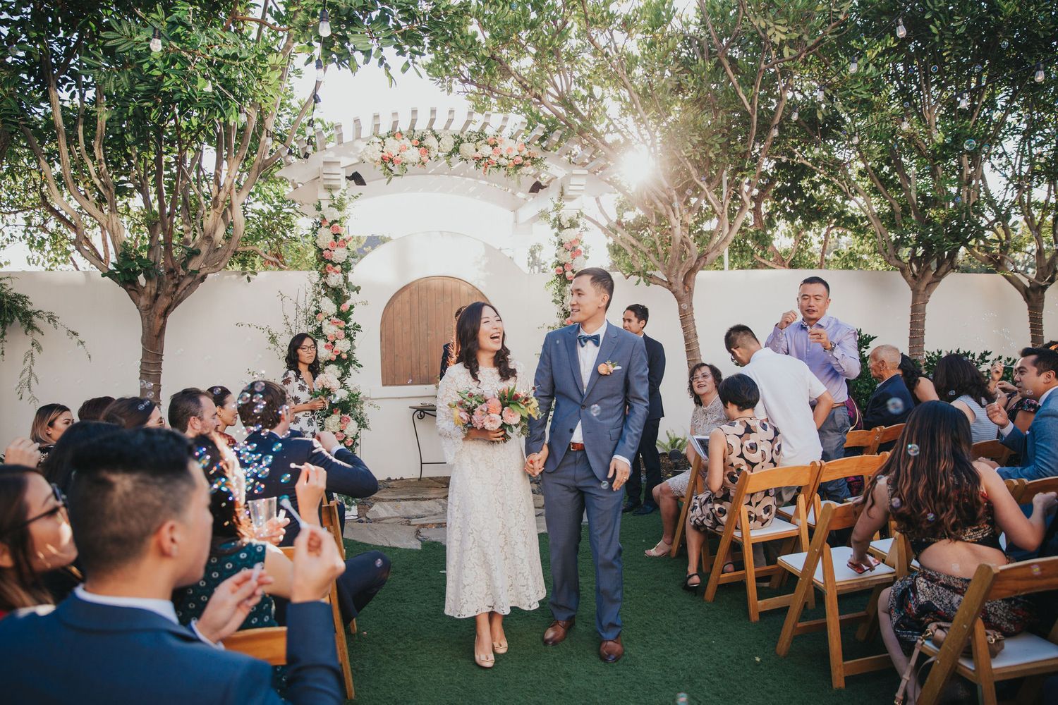 bride & groom exit ceremony at verandas manhattan beach