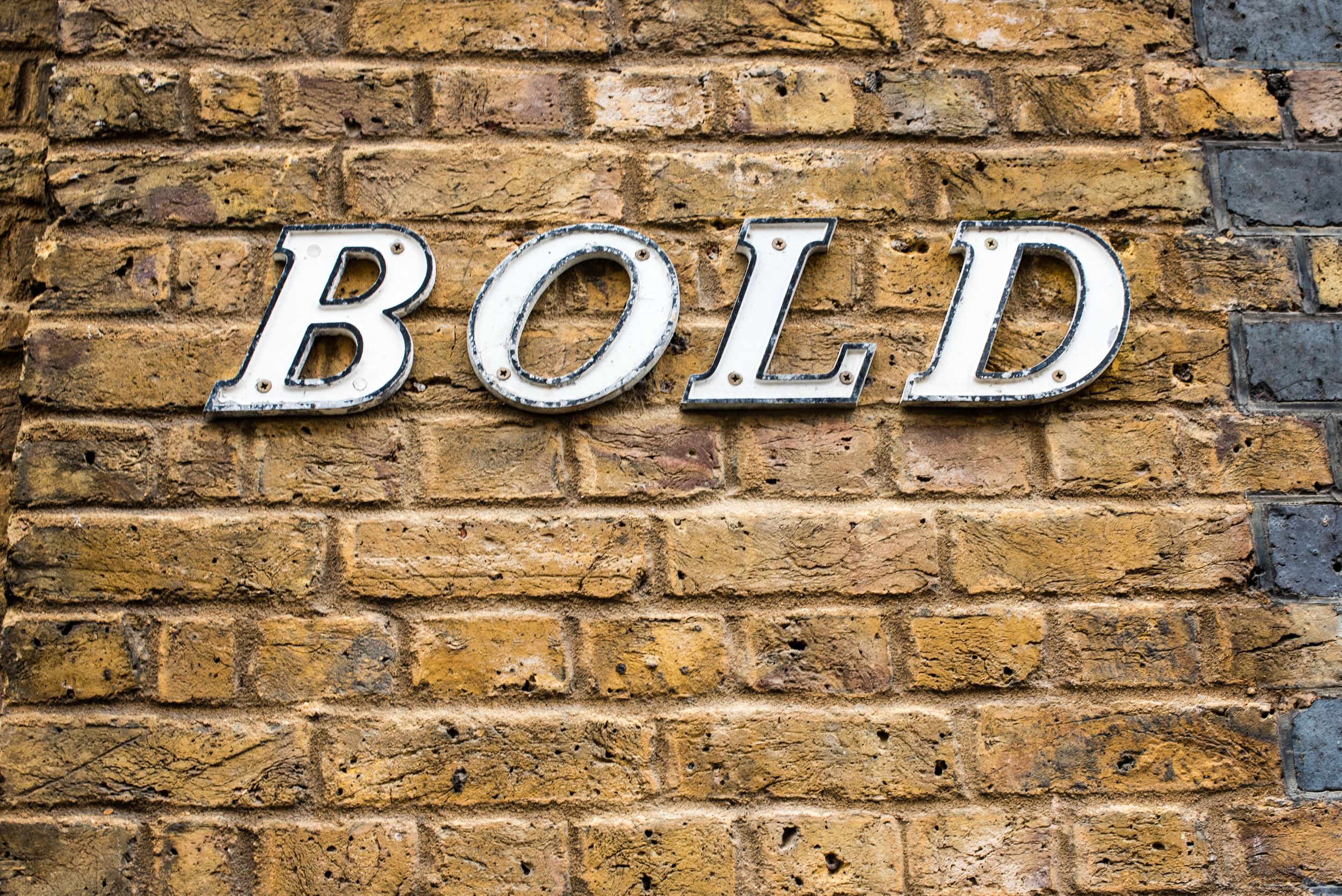 BOLD letters on the face of a building in London's Shoreditch neighborhood