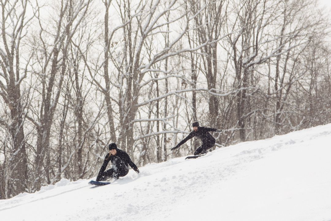 Snow surf in Japan, surfboards on snow down a mountain
