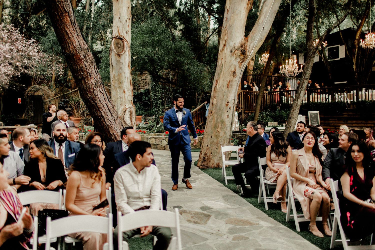 groom walking down altar at wedding ceremony calamigos ranch malibu