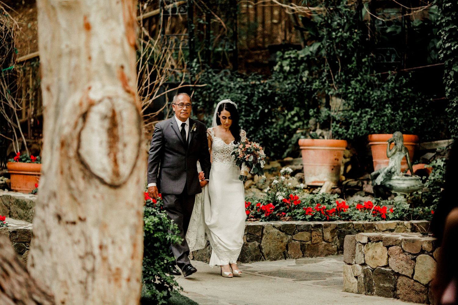 bride walking down altar with father