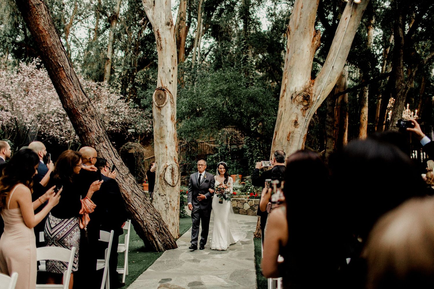 bride and father walking down aisle
