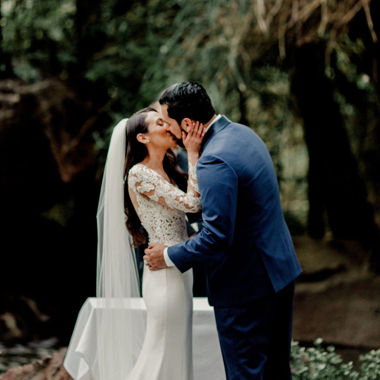bride and groom first kiss as husband and wife