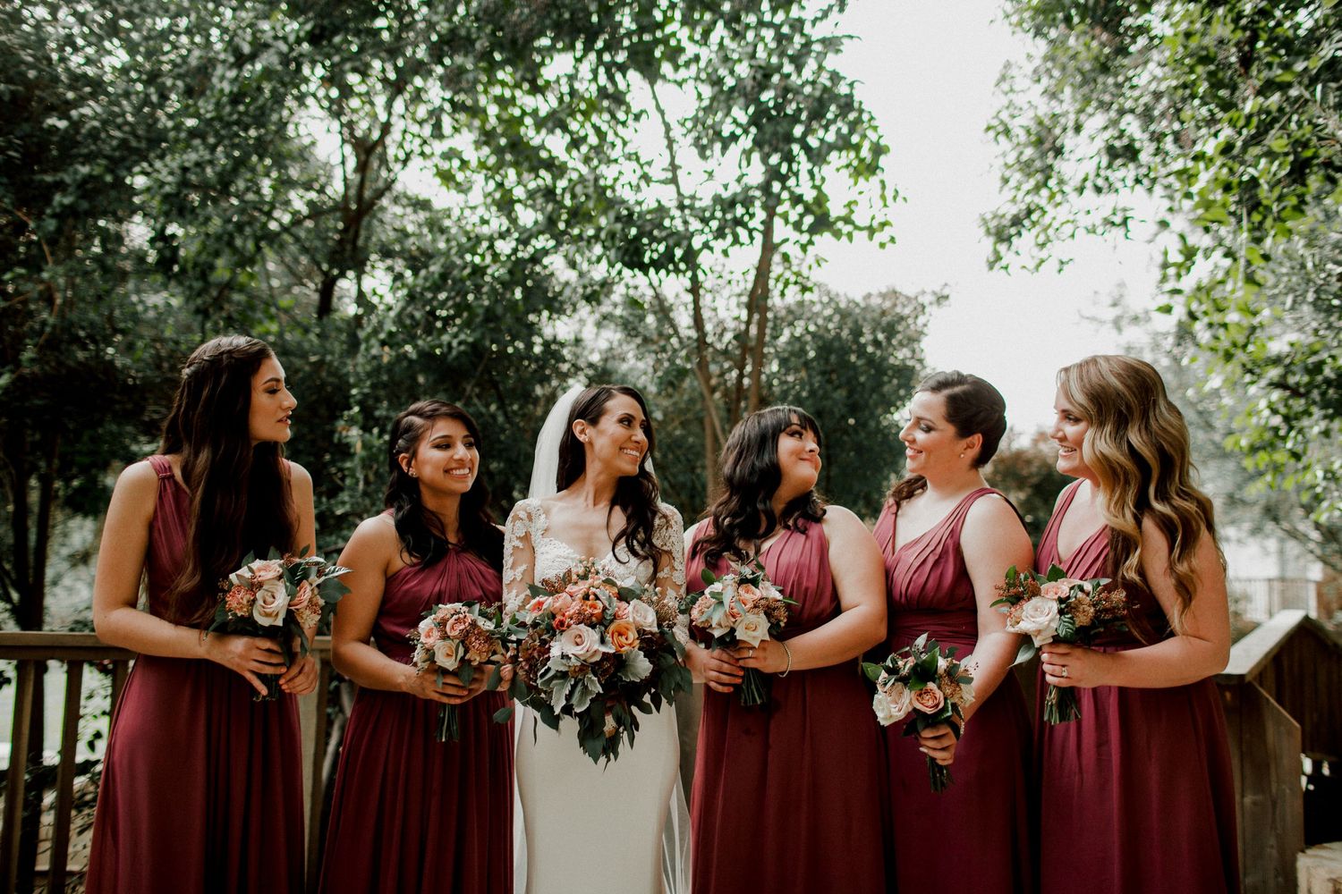 bridesmaids talking amongst each other at calamigos ranch malibu