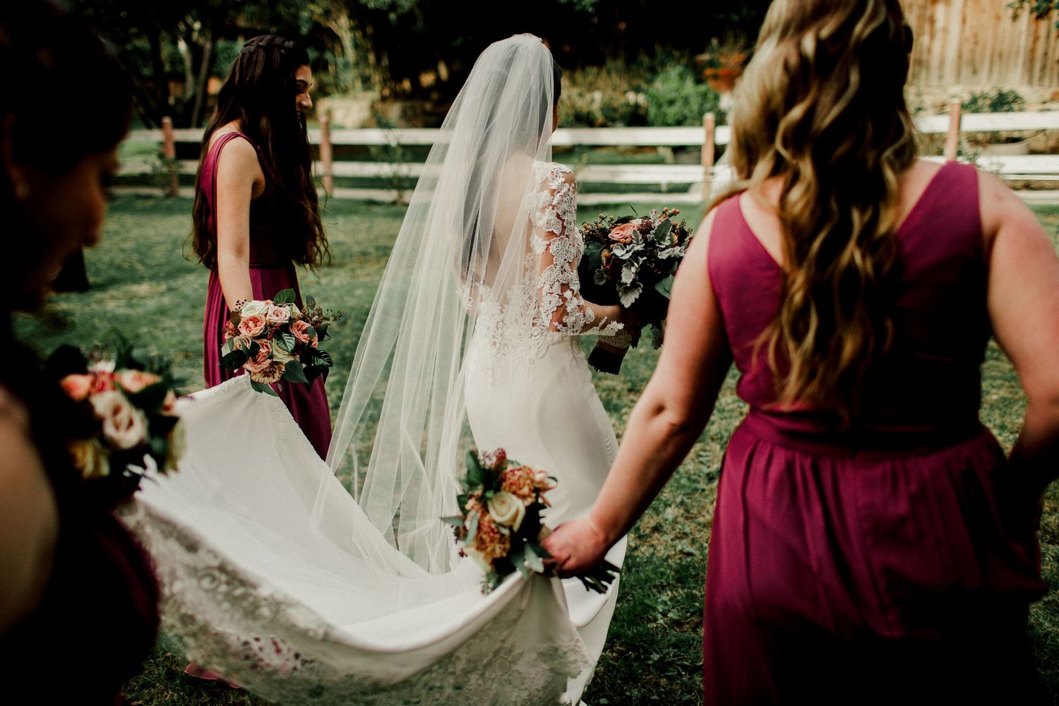 bridal party walking helping bride with dress calamigos ranch malibu