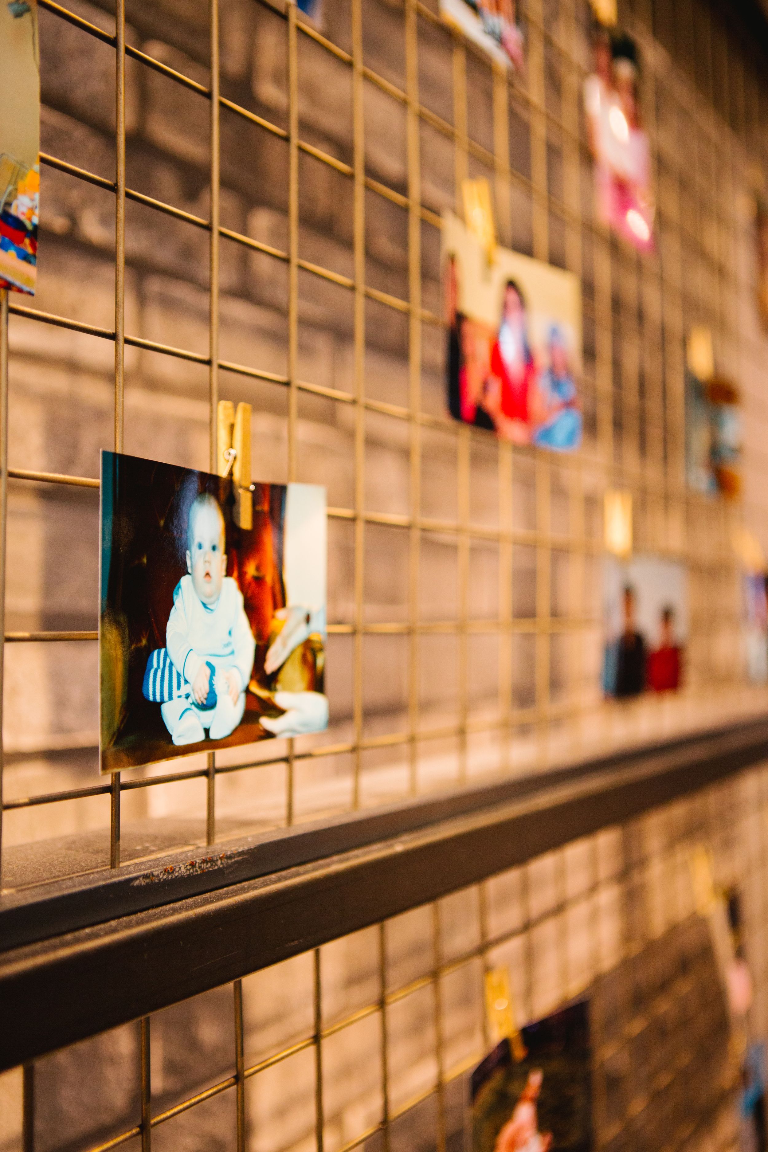 baby picture hung up on wire in industrial wedding venue toronto