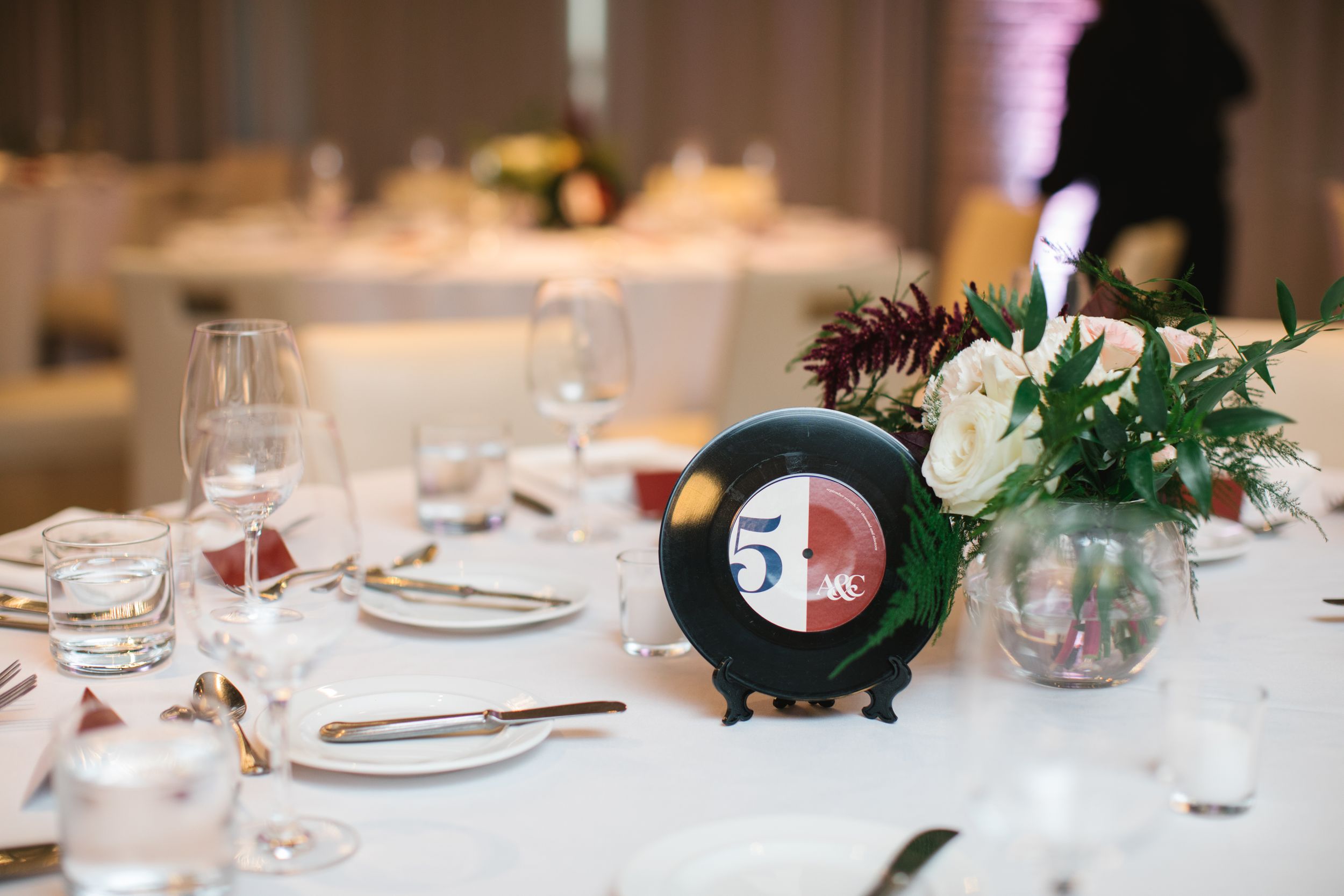 close up of table number on vynil record musical wedding