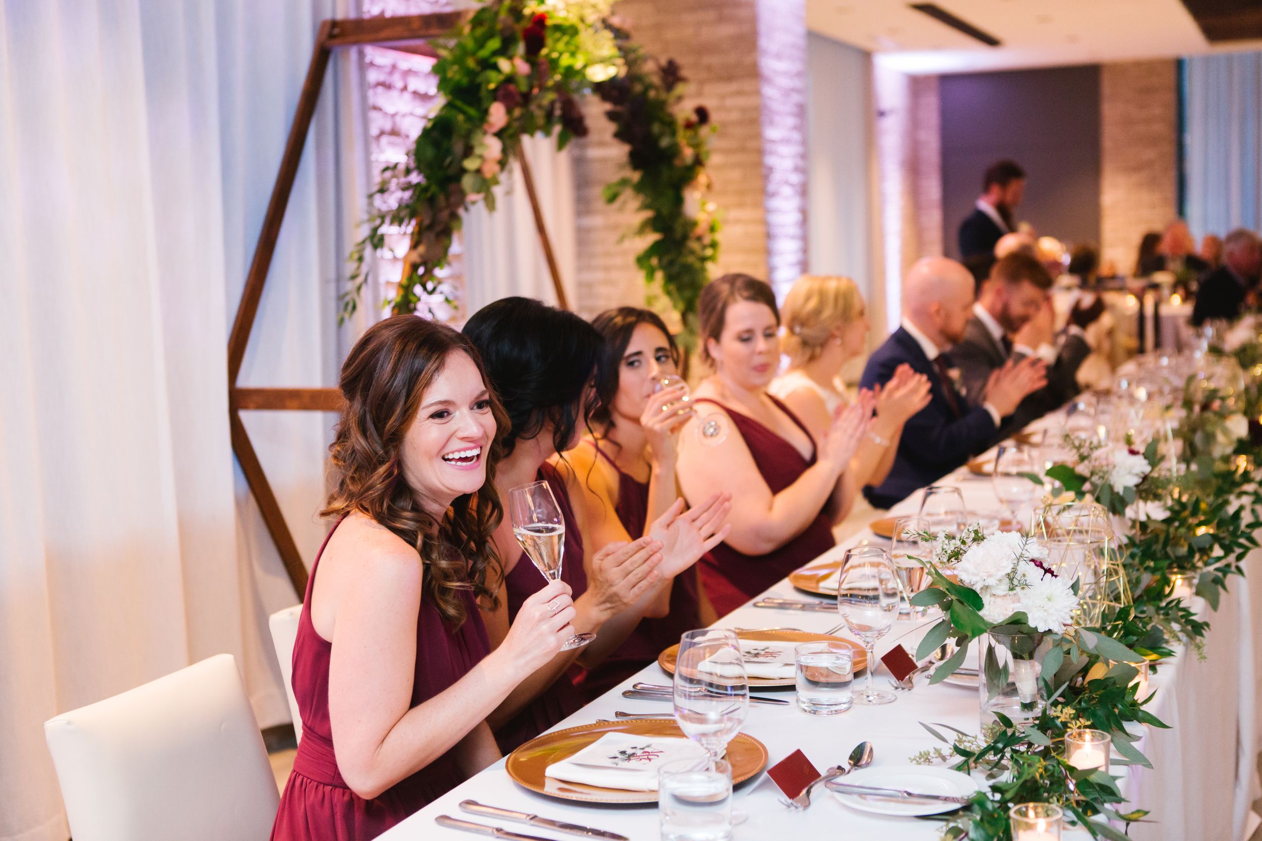 bridesmaid laughing during funny speech wedding