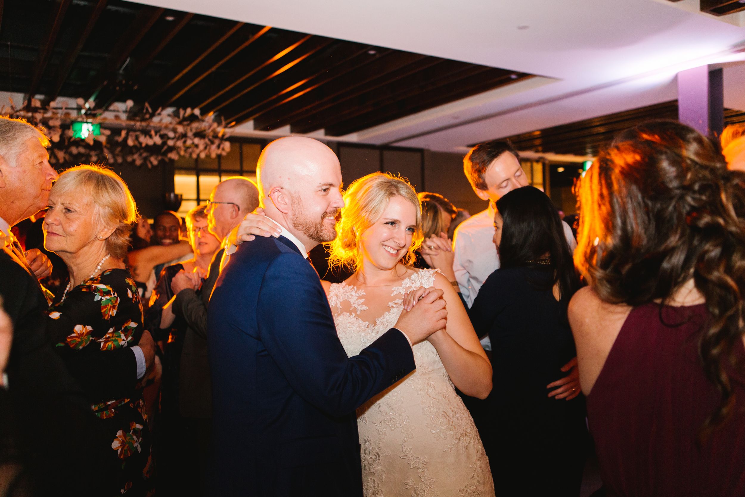 bride and groom slow dance during reception