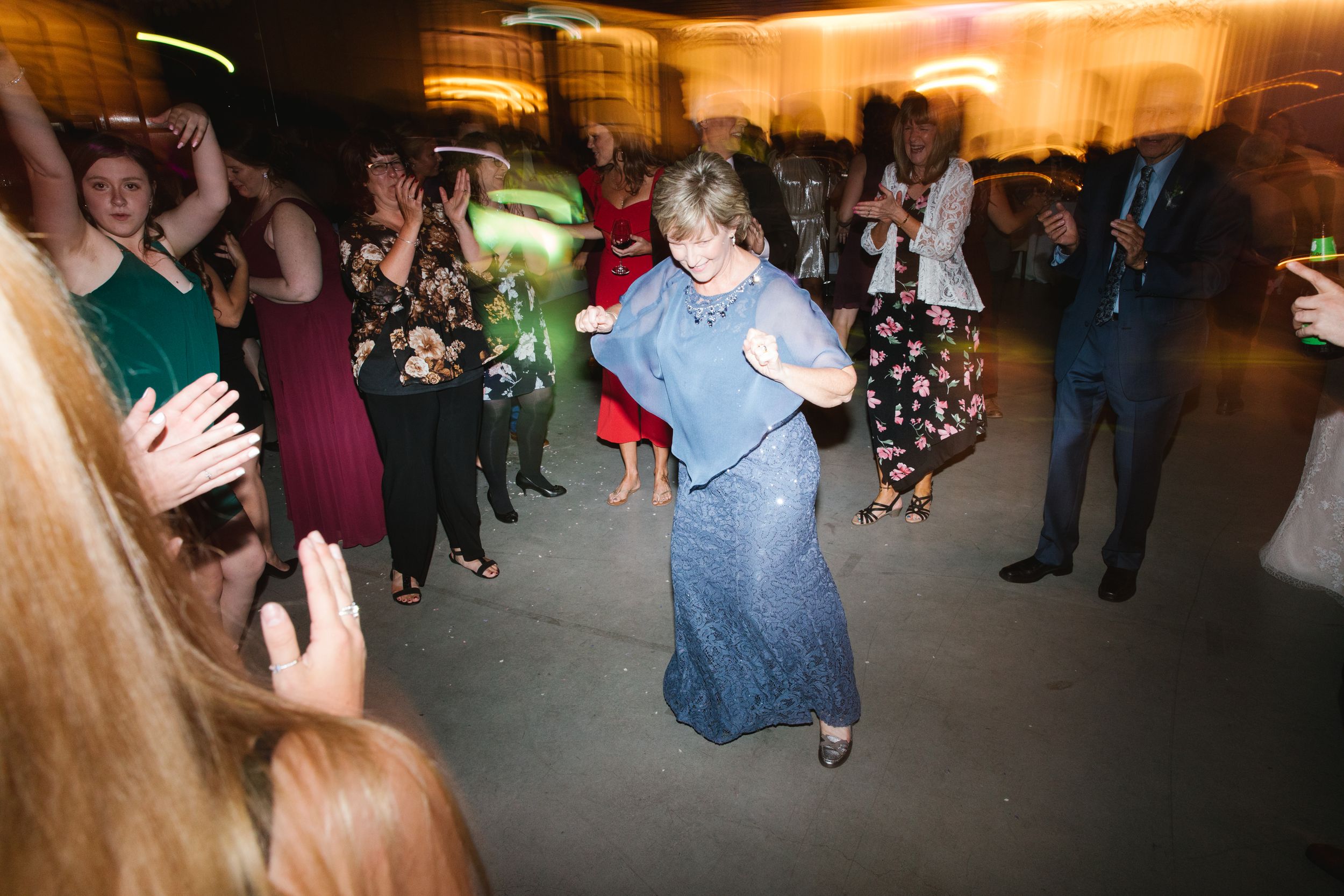 wedding guests dancing during reception