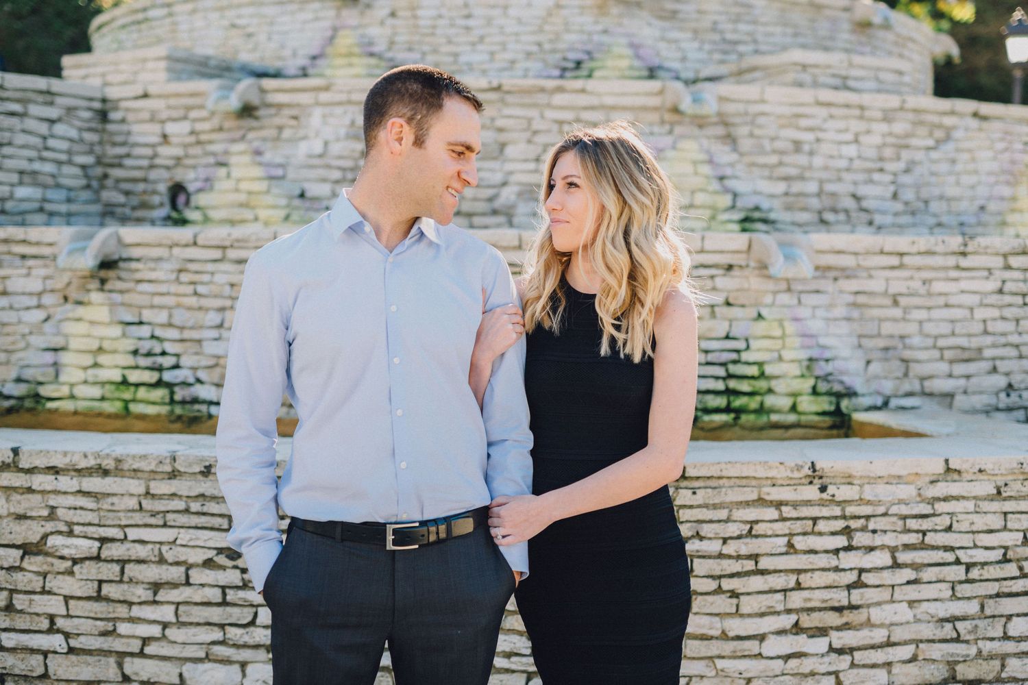 wide fountain engagement photo