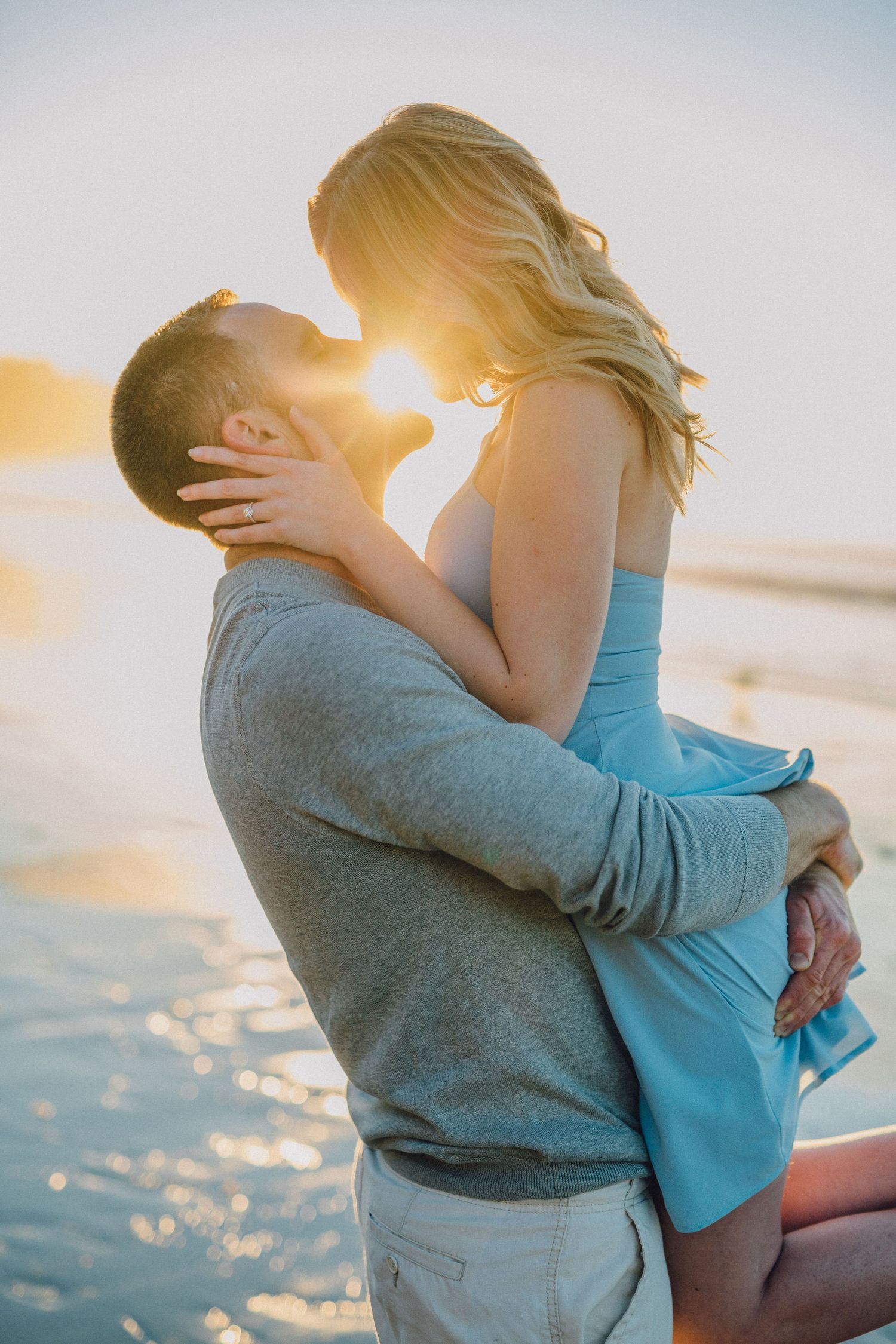 sunlit kiss engagement photo