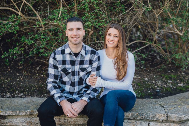 couple sitting engagement photo
