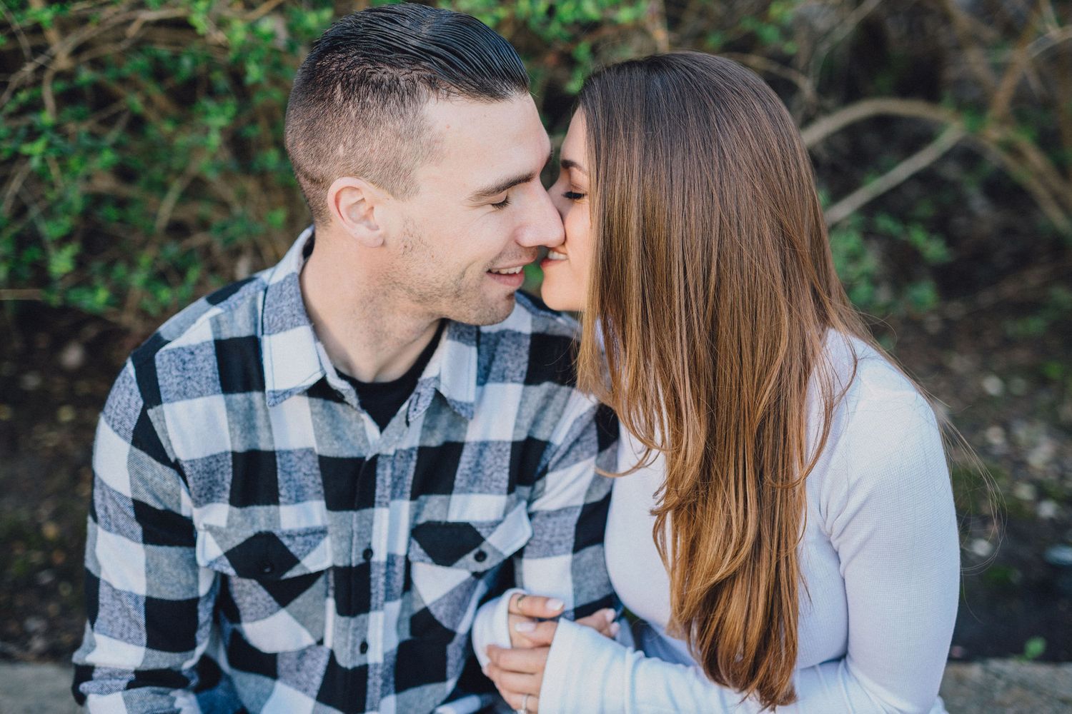 couple kissing engagement photo
