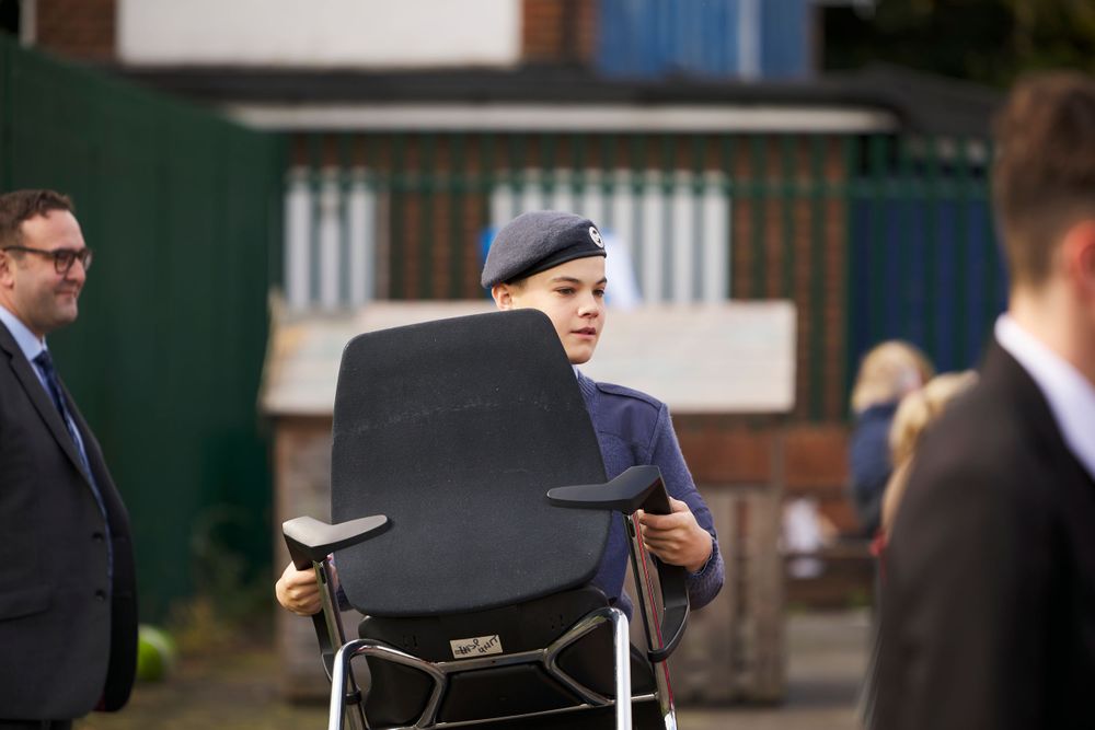 350 (Carshalton & Wallington) Squadron cadet moving seats of guests