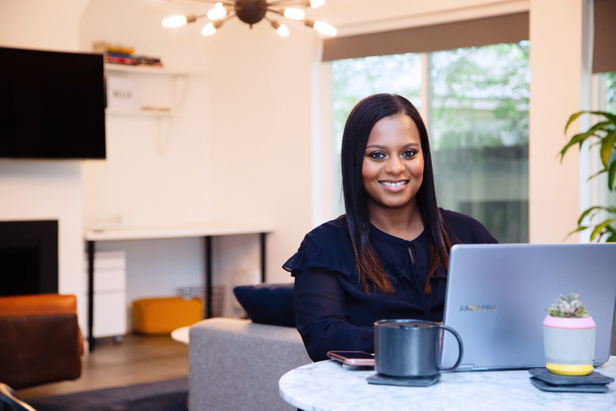 Entrepreneur Mentor Sara Brown at computer in Houston Texas