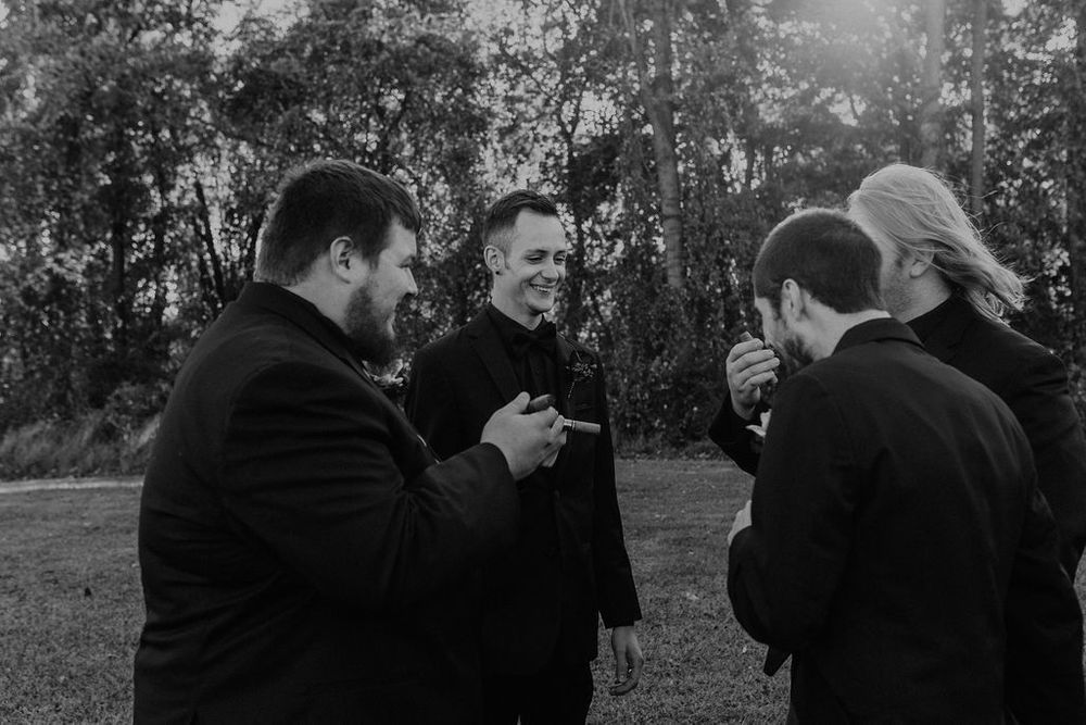 groomsmen smoking cigar