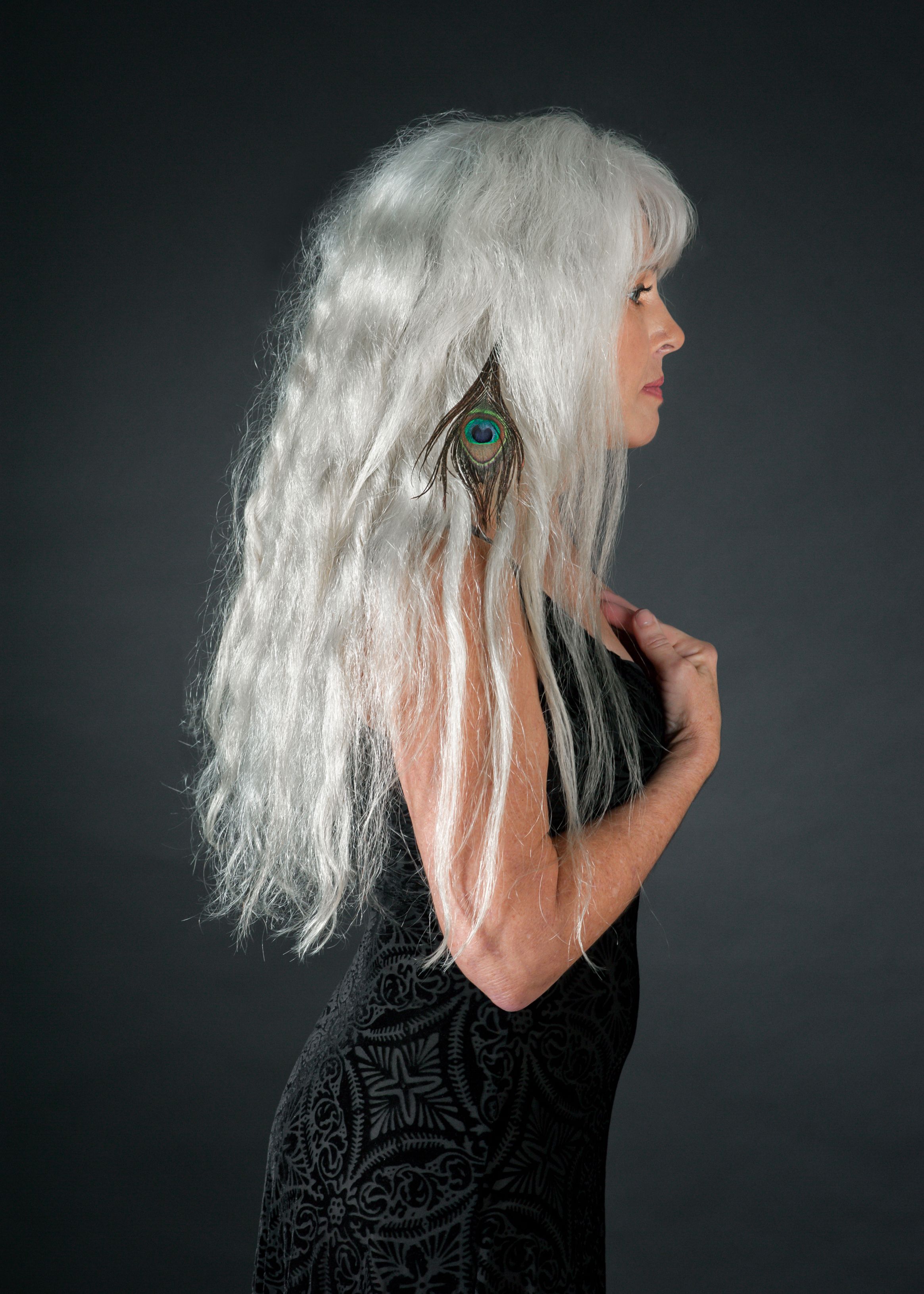 beautiful long silver hair with peacock feather