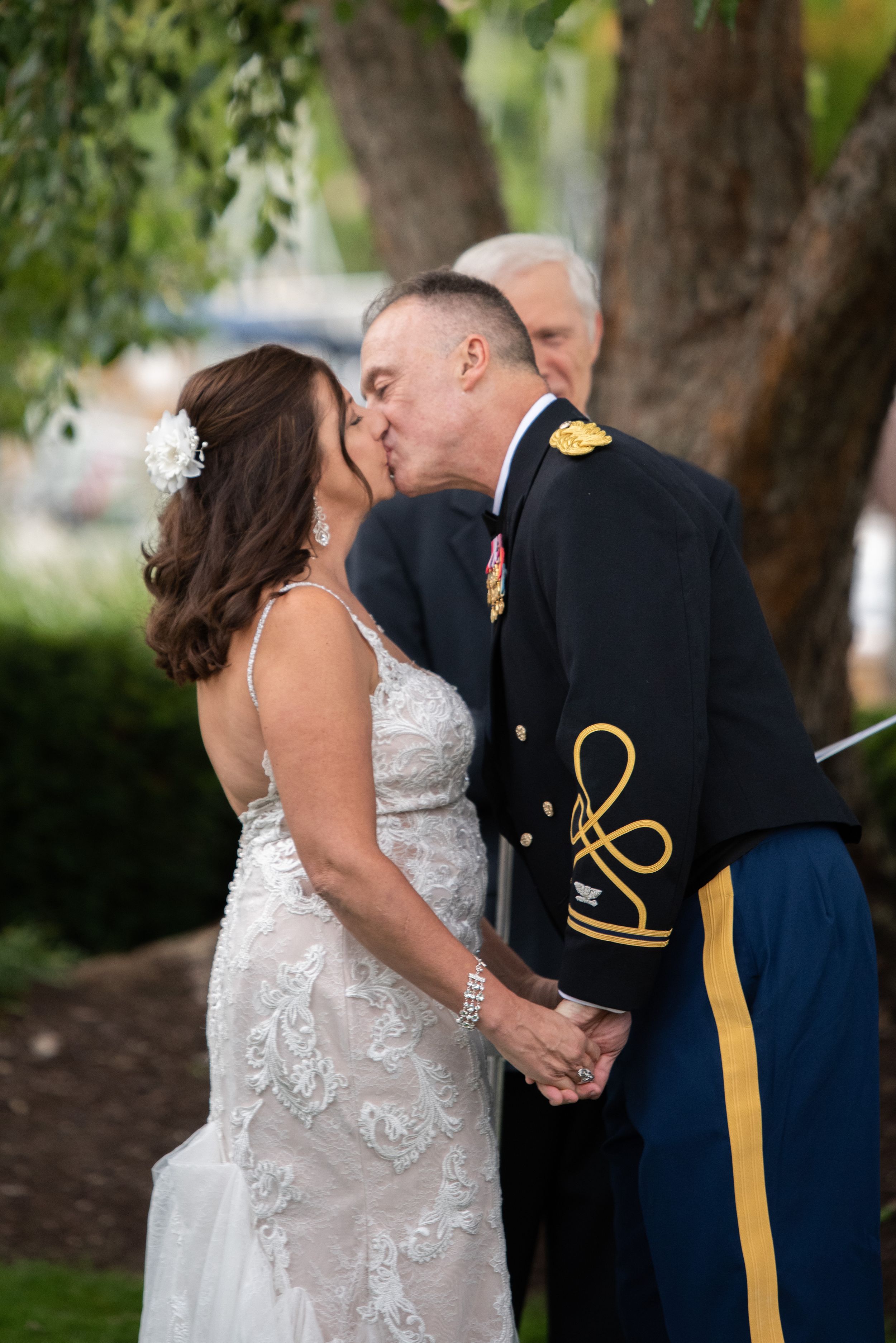 first kiss at outdoor wedding, Cleveland Yachting Club, Ohio