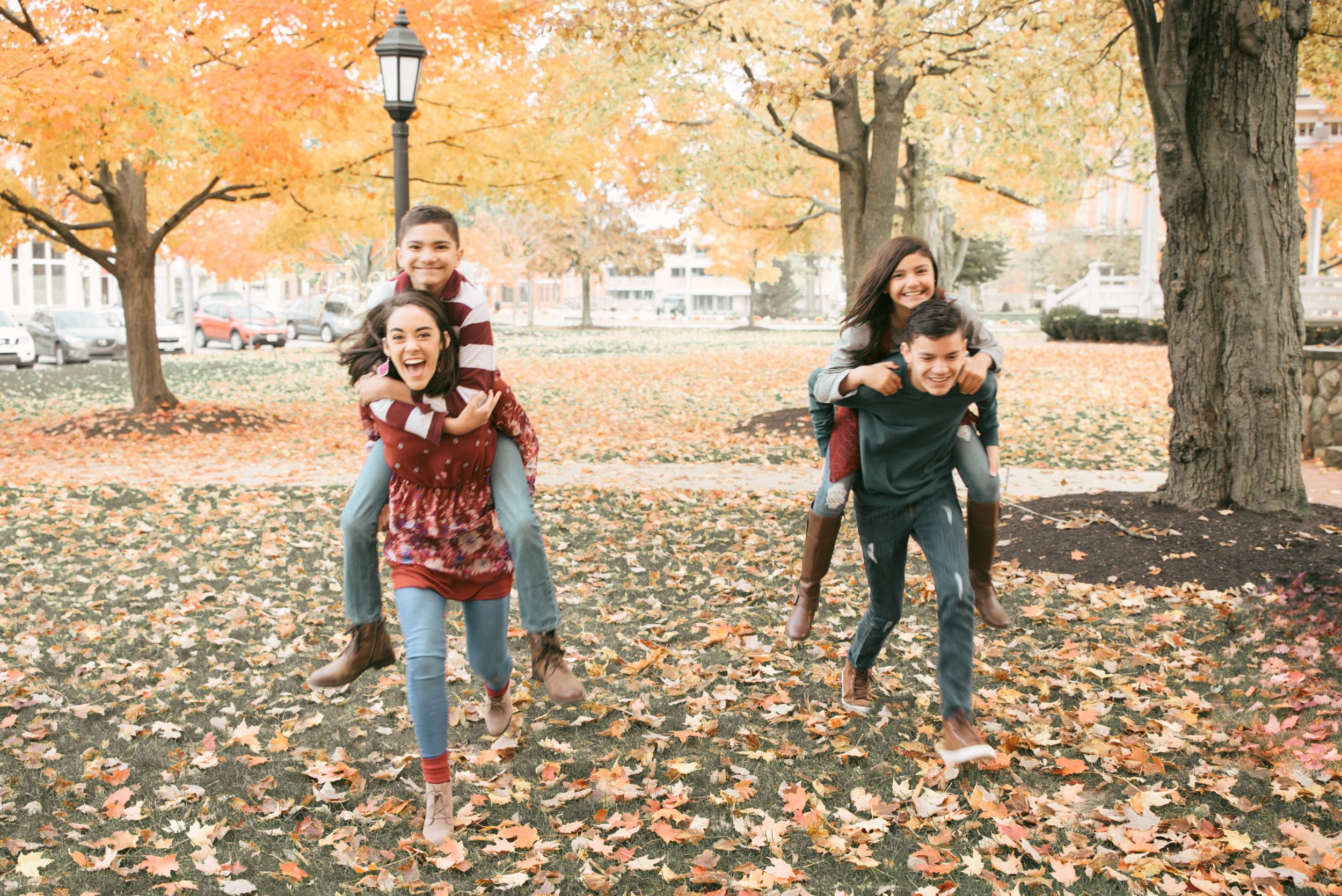 family of six pose, Chardon Square in fall, Chardon , Ohio