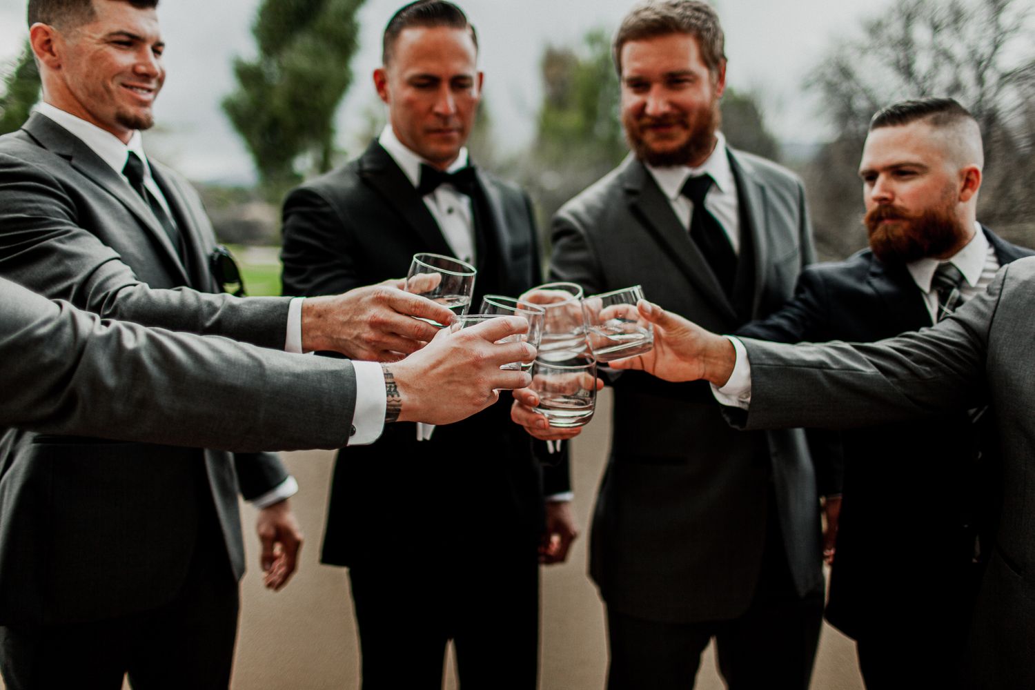 groomsmen cheer-sing drinks