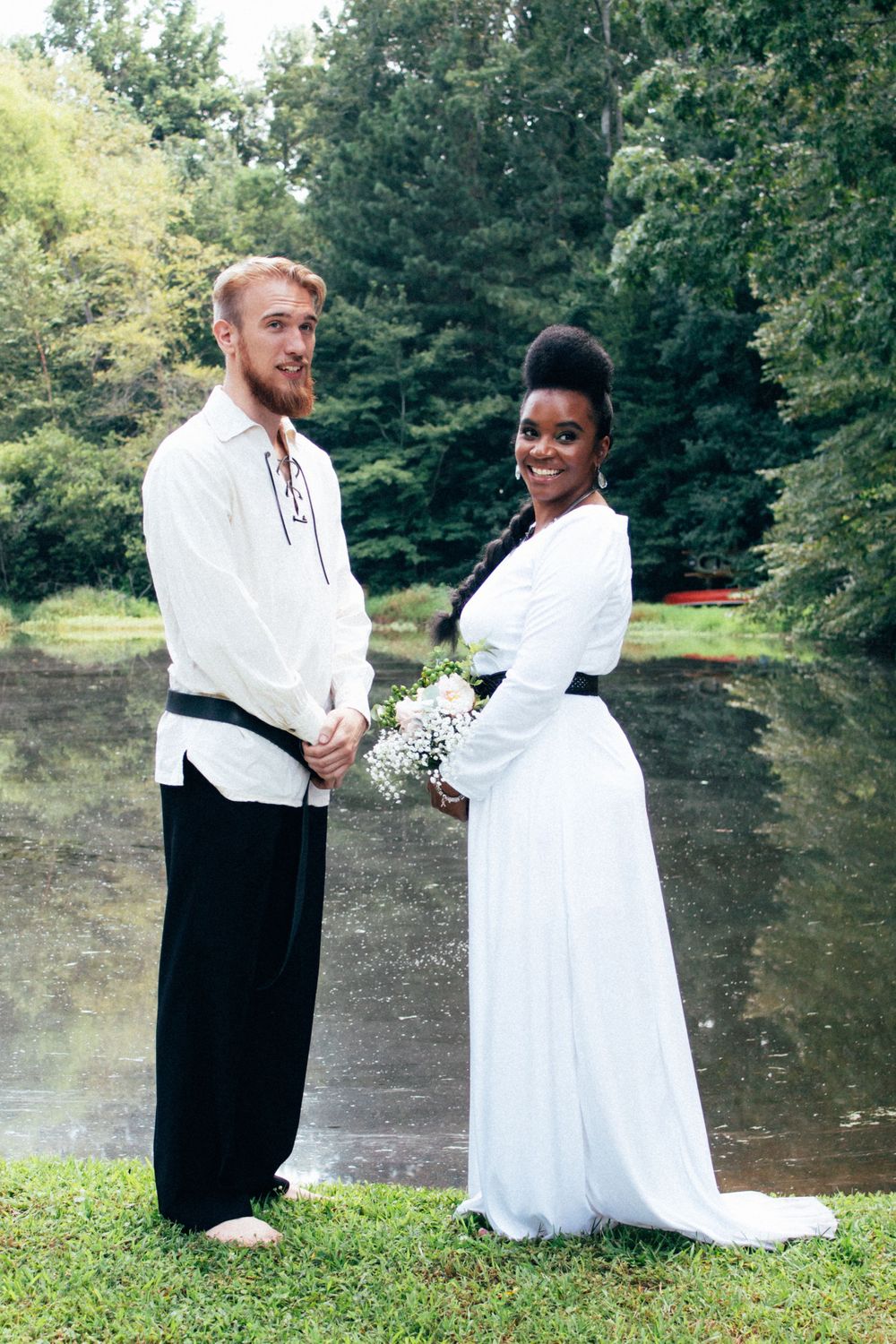 Viking couple on shore of lake