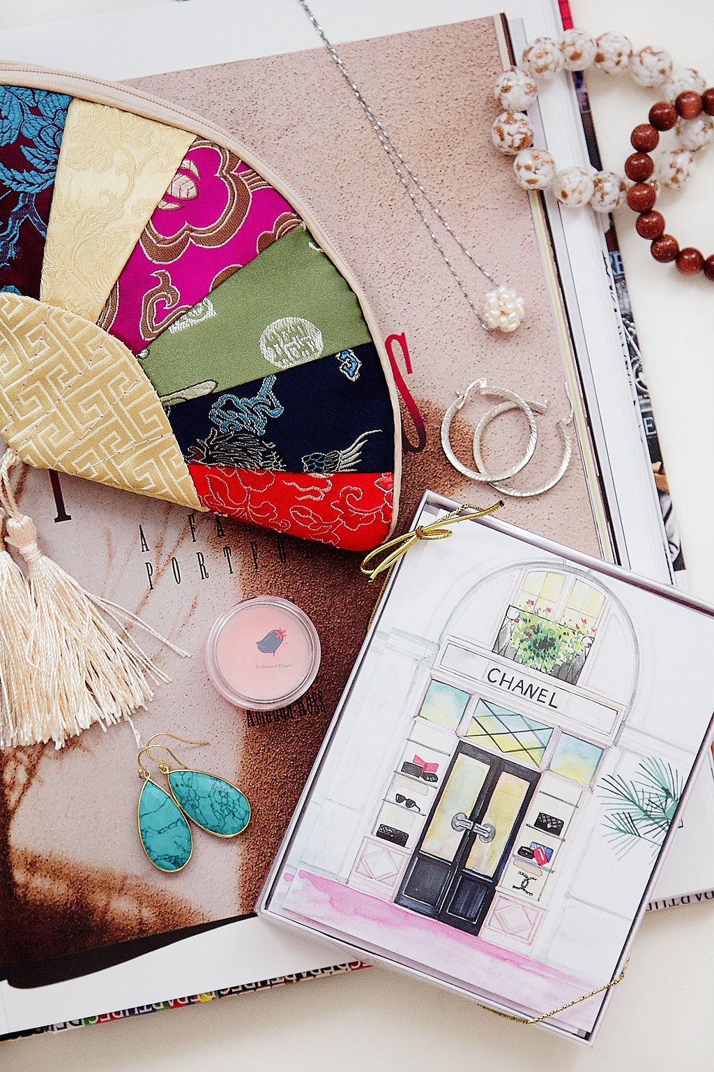 Flat-lay photography of boutique items and magazine