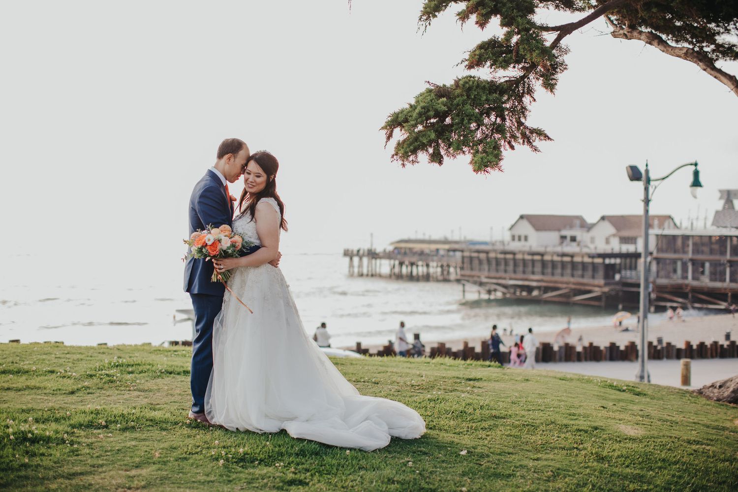 bride & groom overlooking redondo beach pier