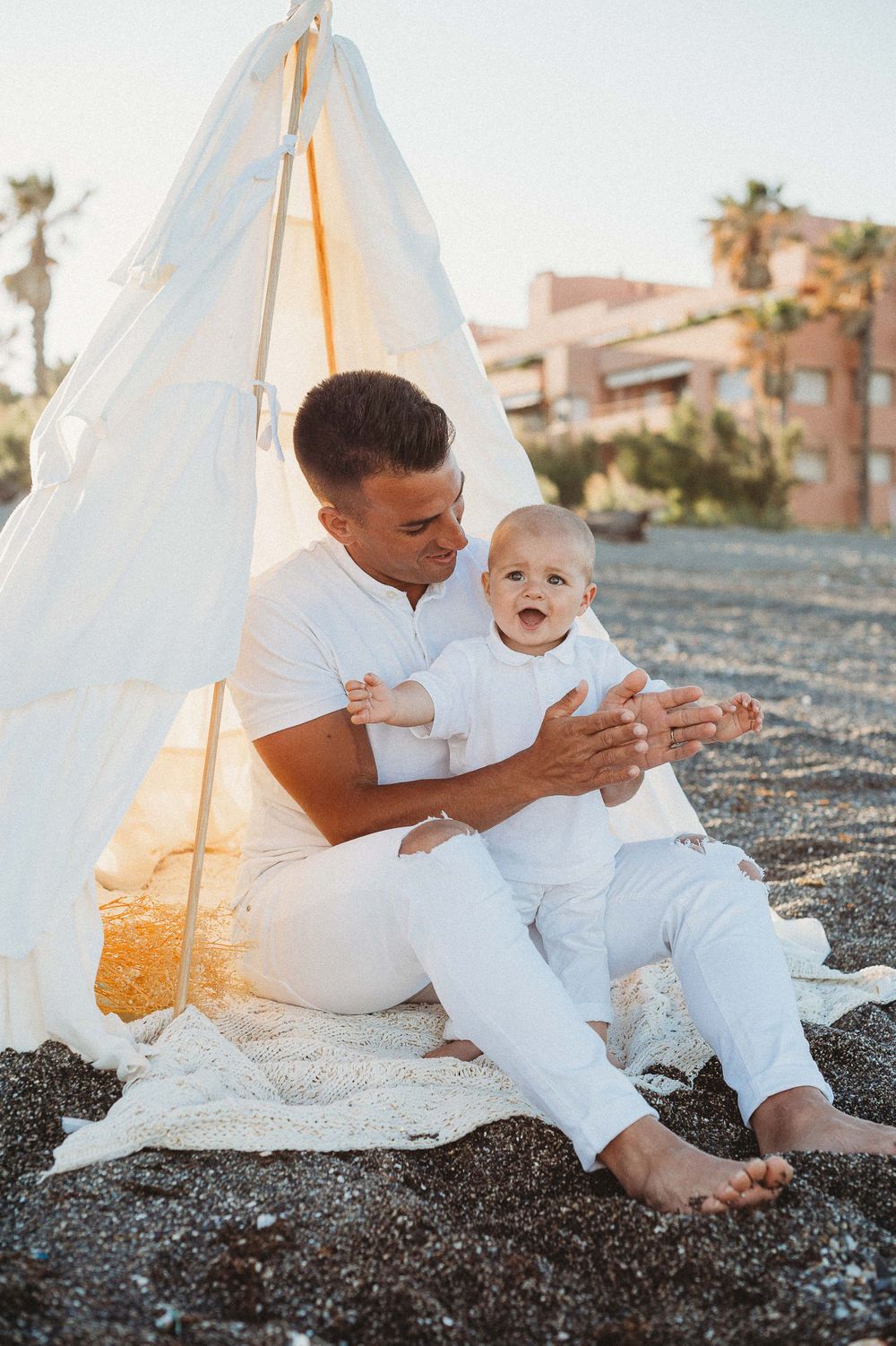 Portrait of a son and dad on the beach in Sotogrande
