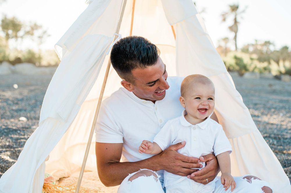 Dad and his son laughing together
