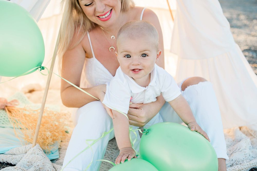 baby boy with balloon
