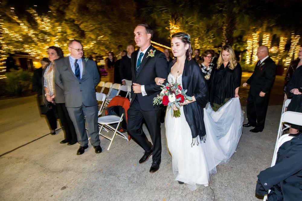 Bride and groom walk down the aisle during their wedding ceremony at Riverbanks Zoo in Columbia, SC