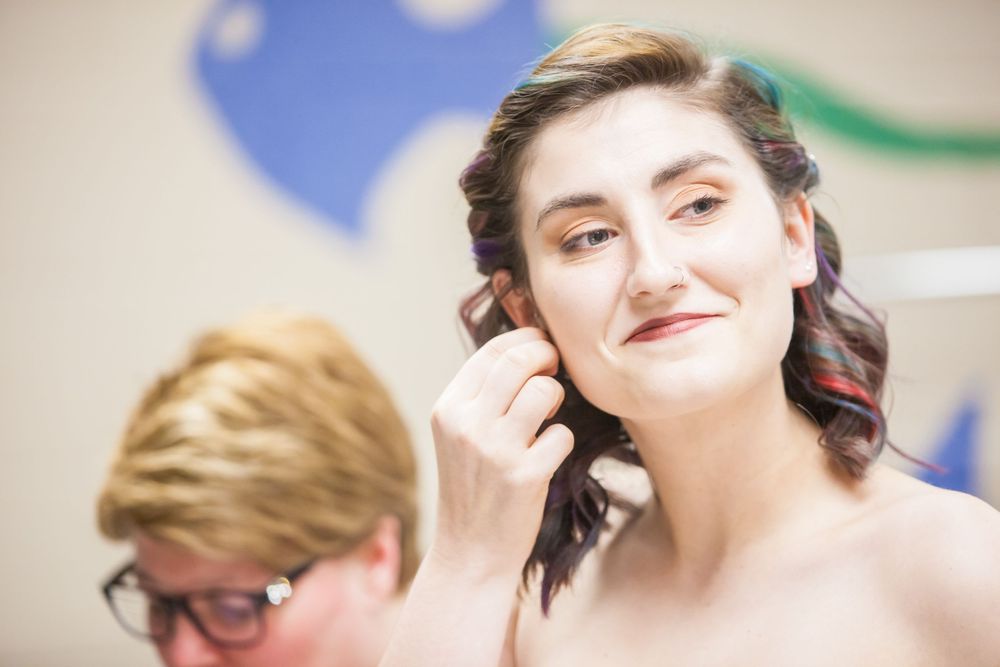 Bride gets ready before her wedding at Riverbanks Zoo in Columbia, SC