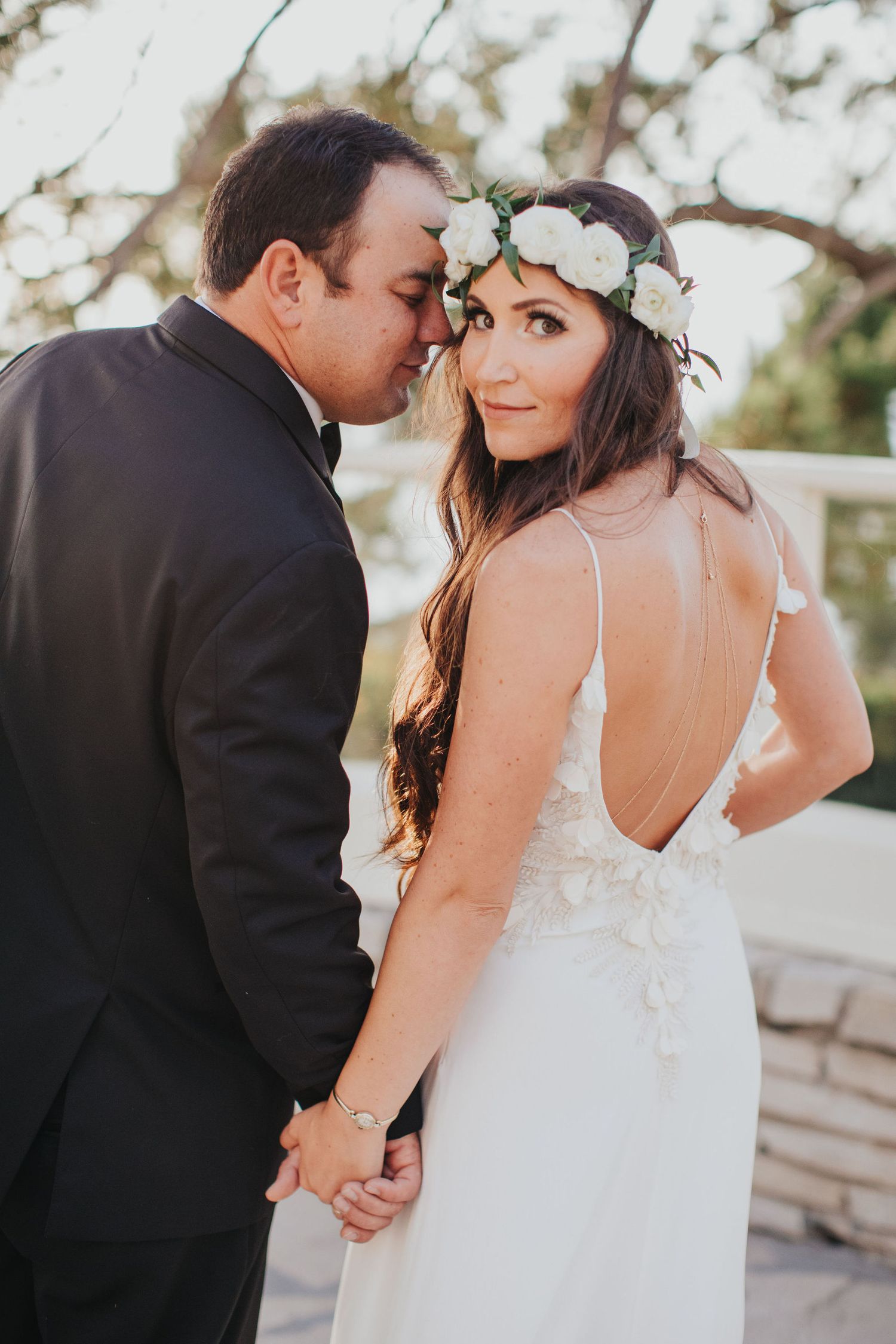 groom kissing brides cheek at la venta inn
