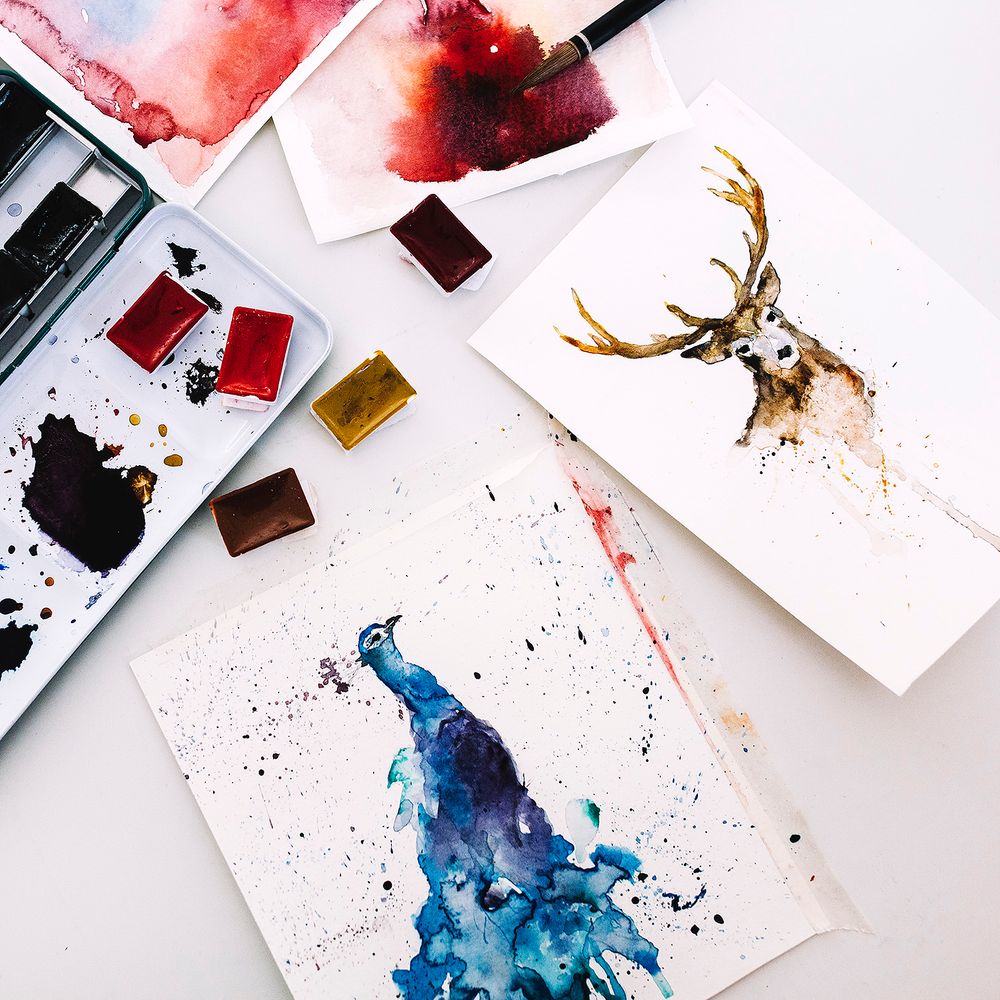 A deer and a peacock watercolor