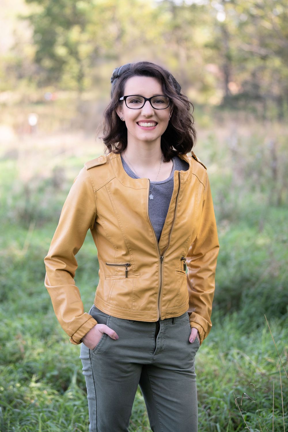 glasses, senior girl, yellow jacket, mustard color