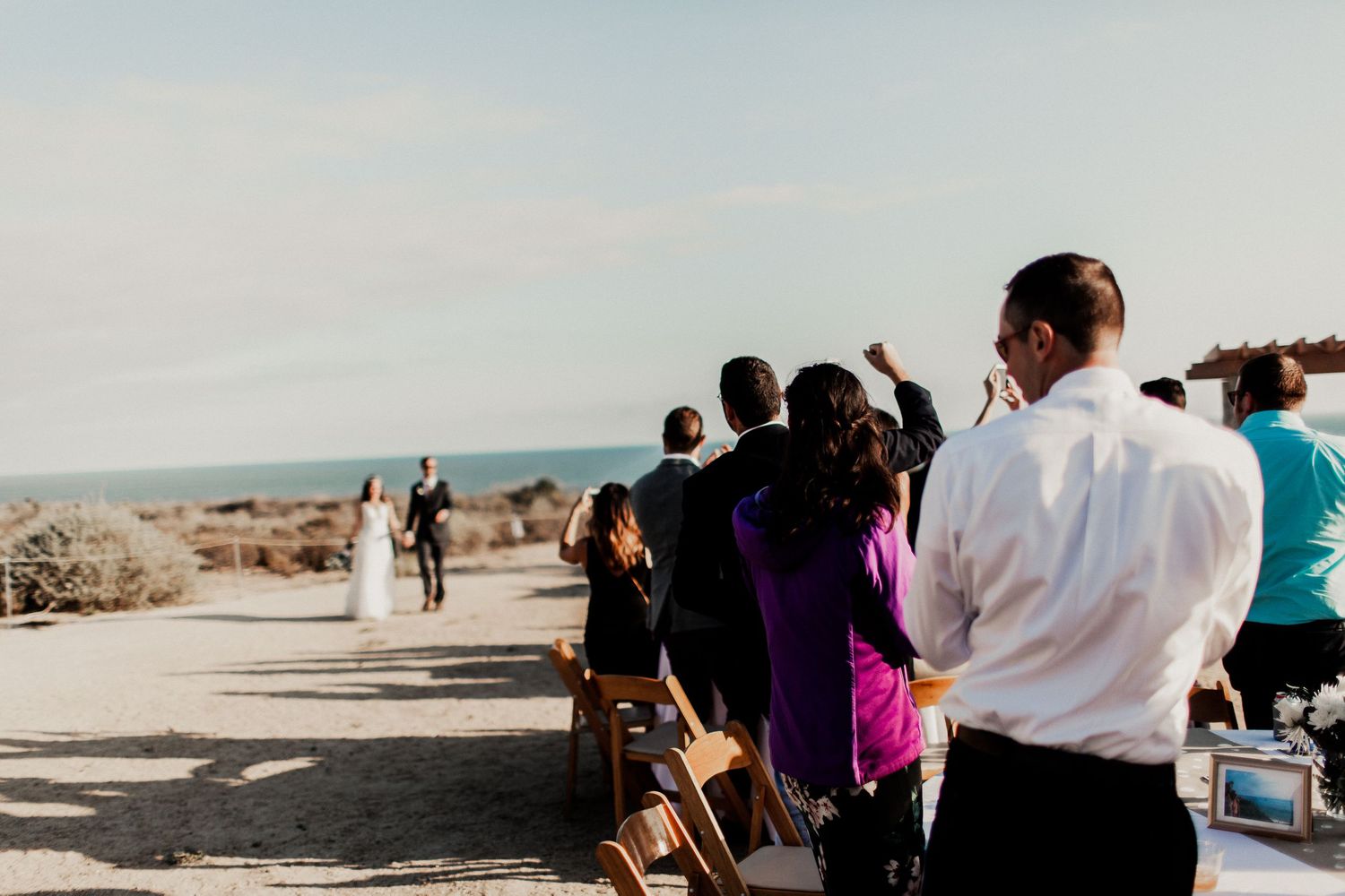 guests cheering bride and groom grand entrance