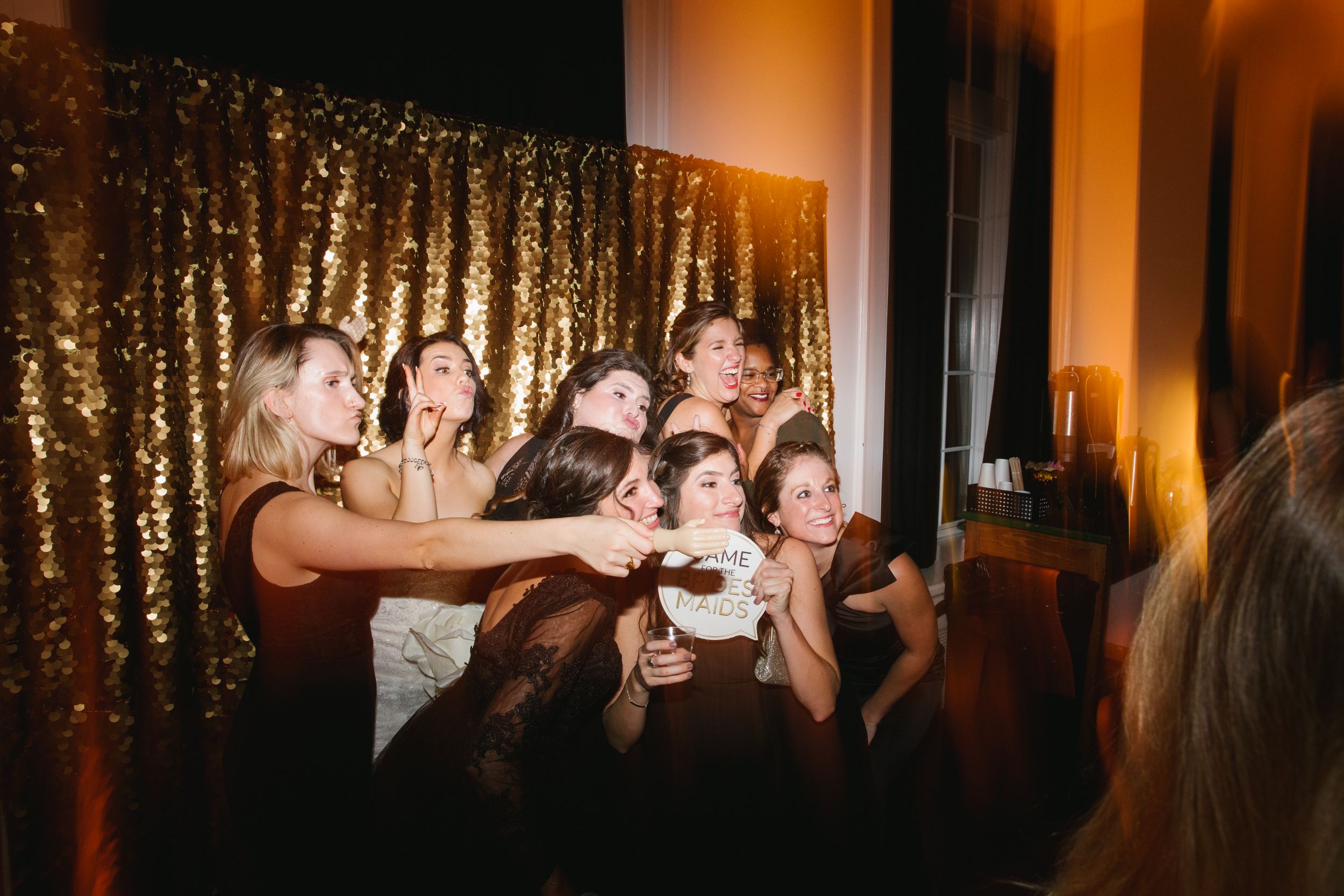 girls posing for photo booth during wedding reception toronto