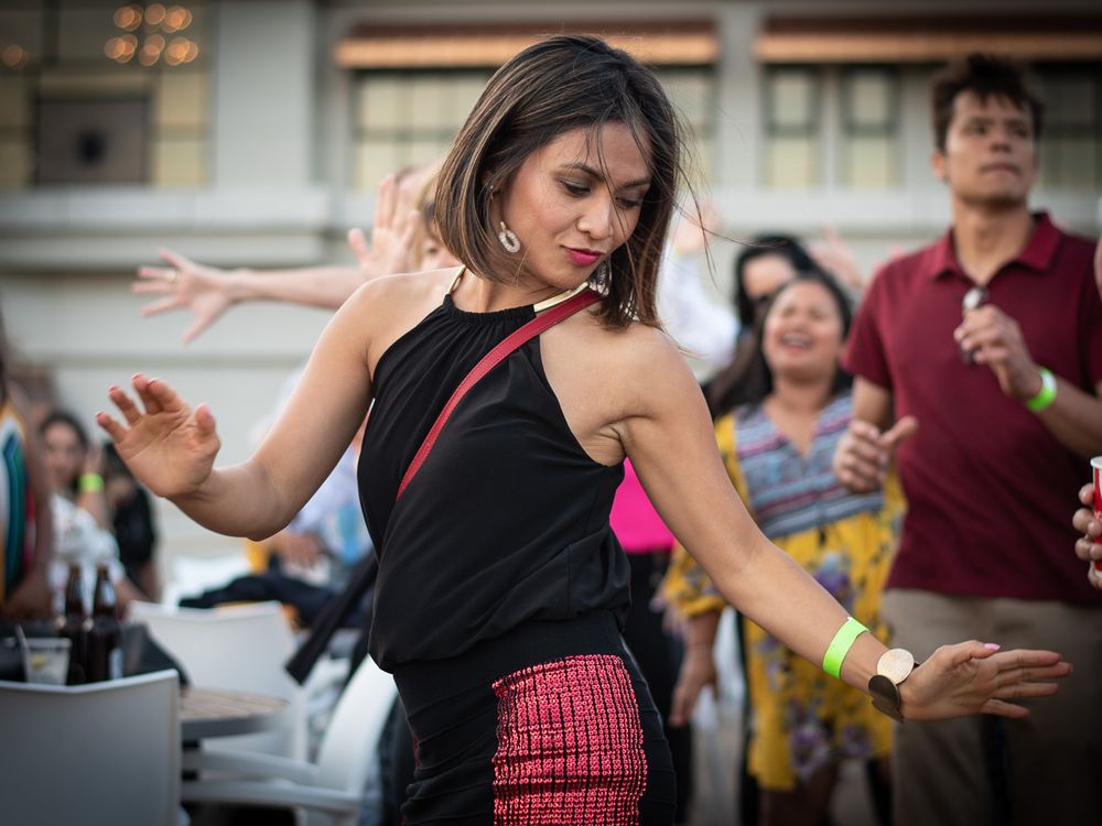 Attractive Hispanic woman dancing.