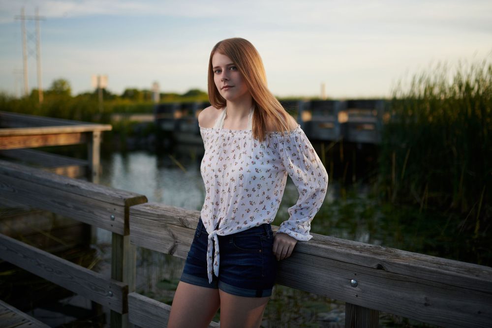 Senior photo on a pier near Green Lake