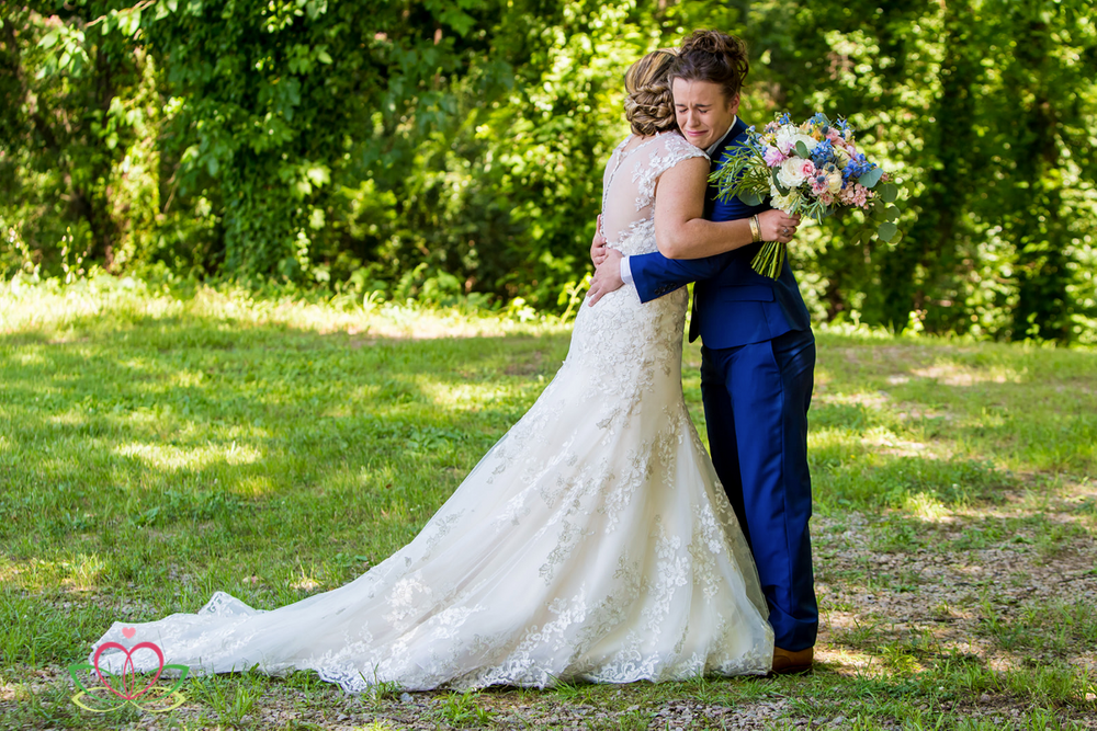 Two brides have their First Look before a same-sex wedding ceremony at Senate's End in Columbia, SC