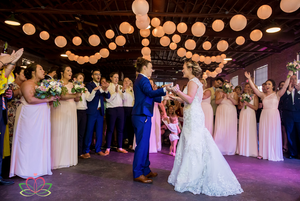 The two brides share their first dance during a same sex wedding at Senate's End in Columbia, SC