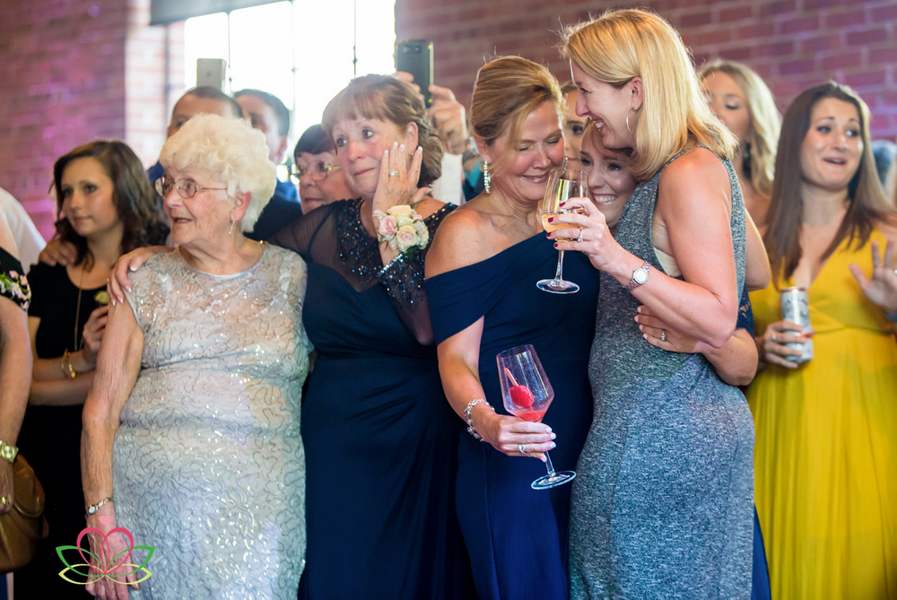 Mothers of the brides cry during the first dance at a same sex wedding at Senate's End in Columbia, SC