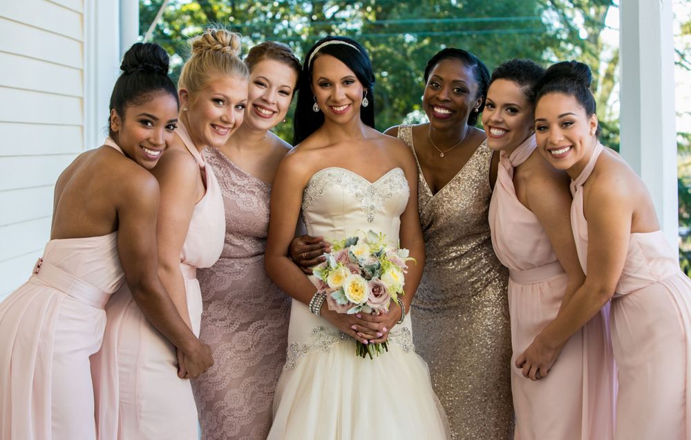 Miranda poses with her bridesmaids her wedding to Marcus Lattimore at the Lace House in Columbia, SC.Photo by Jeff Blake