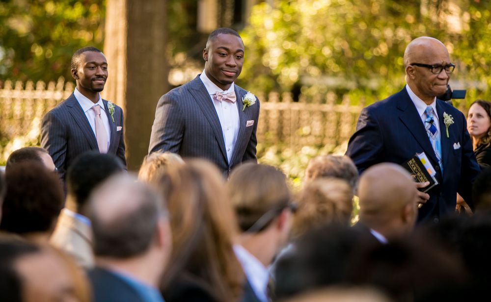 Marcus Lattimore walks down the aisle during his wedding at the Lace House in Columbia, SC. Photo by Jeff Blake