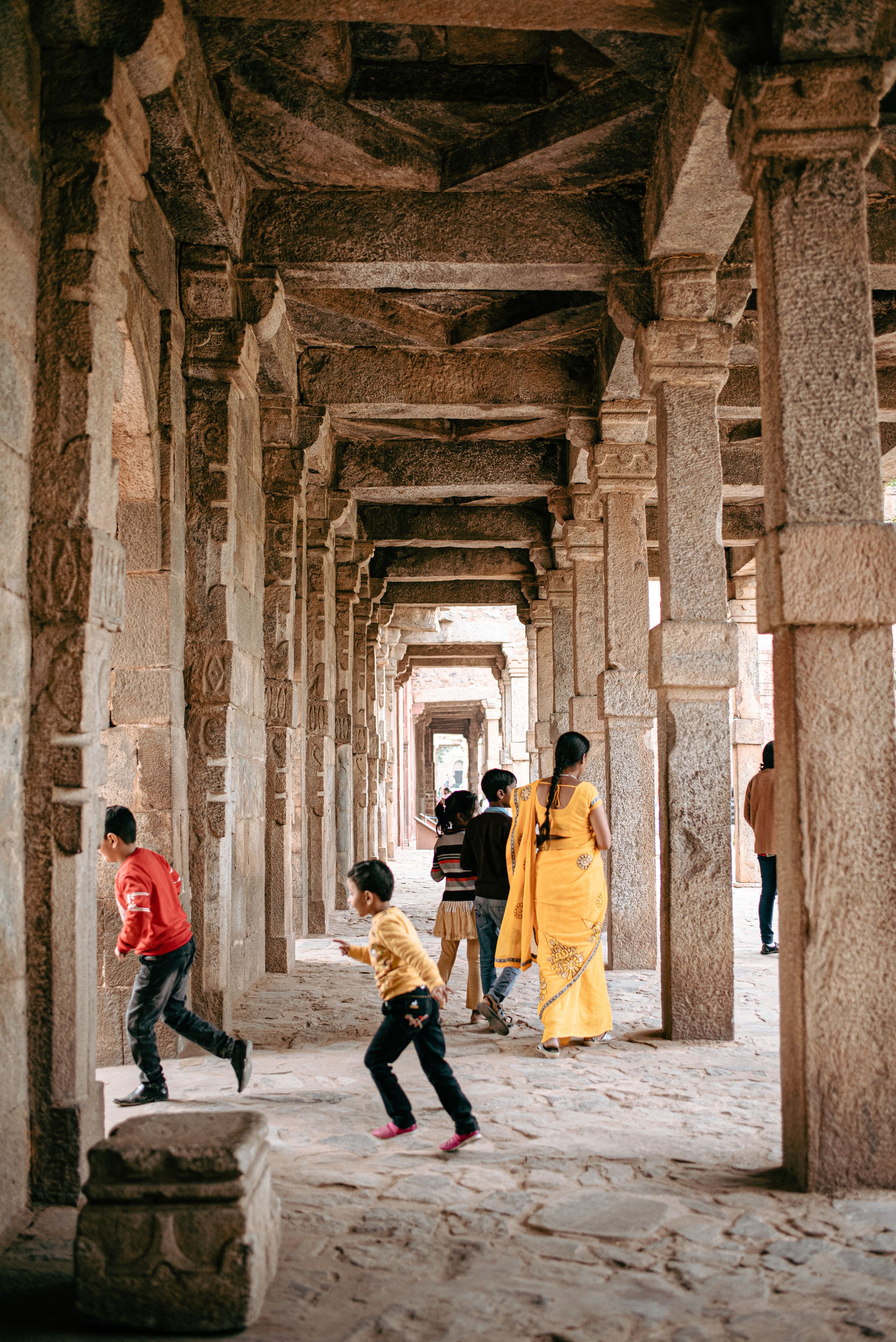 Child's play at Qutub Minar, Delhi. India.