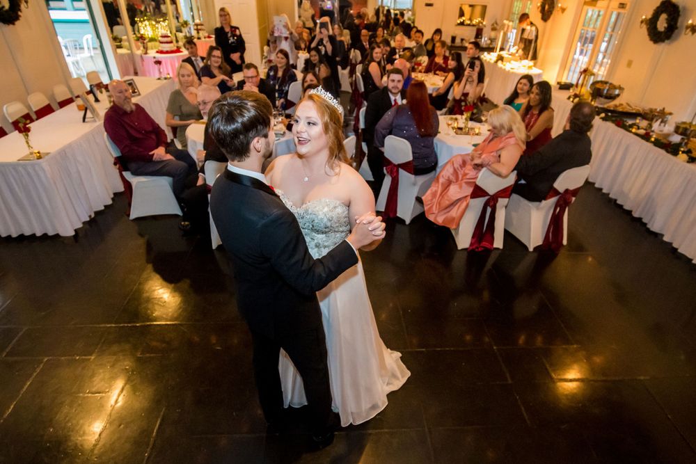 Bride and groom share their first dance during a wedding reception at Winter Green Woods in Lexington, SC